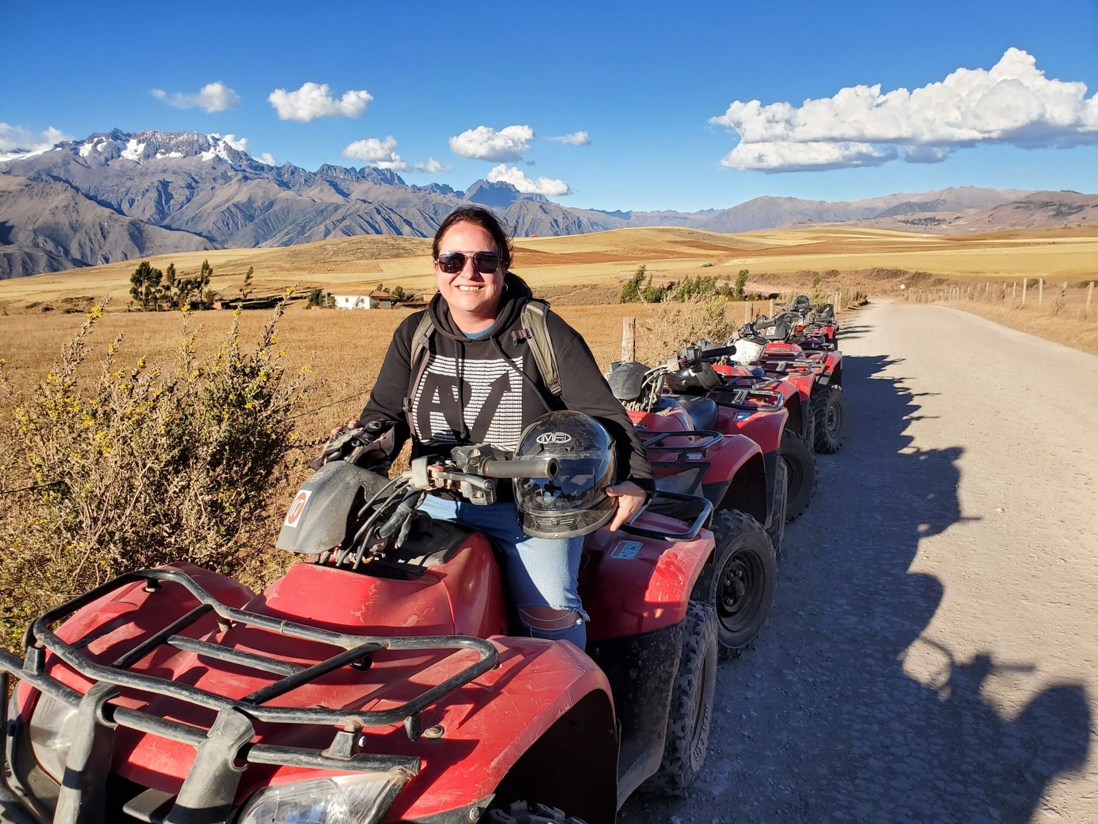 girl on 4 wheeler in andes mountains