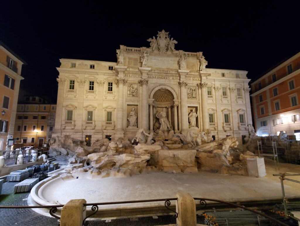 vegans admiring the trevi fountain in rome