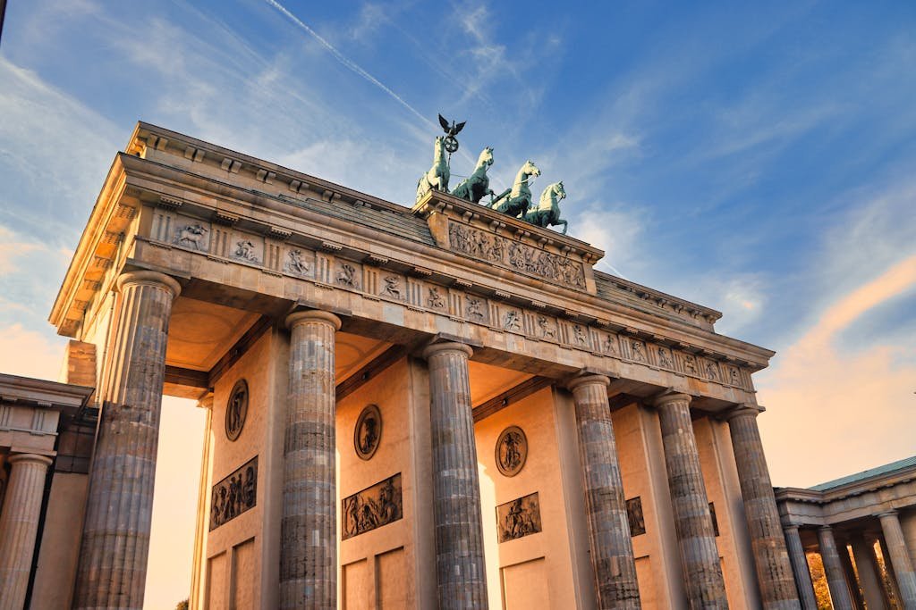 Stunning view of the Brandenburg Gate in Berlin during sunset, showcasing its iconic architecture.