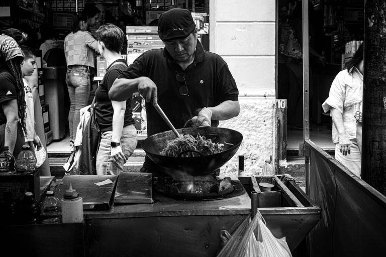 affordable street food vendor cooking cheap vegan food abroad
