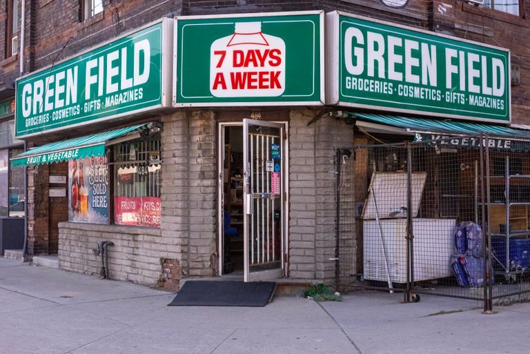Exterior view of Green Field grocery store open 7 days a week.