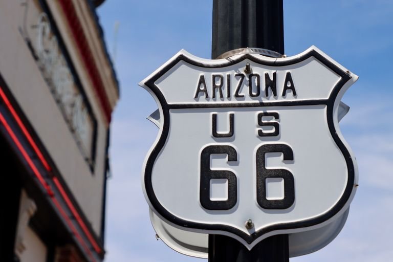 Close-up of the famous Route 66 sign in Arizona, symbolizing historic travel.