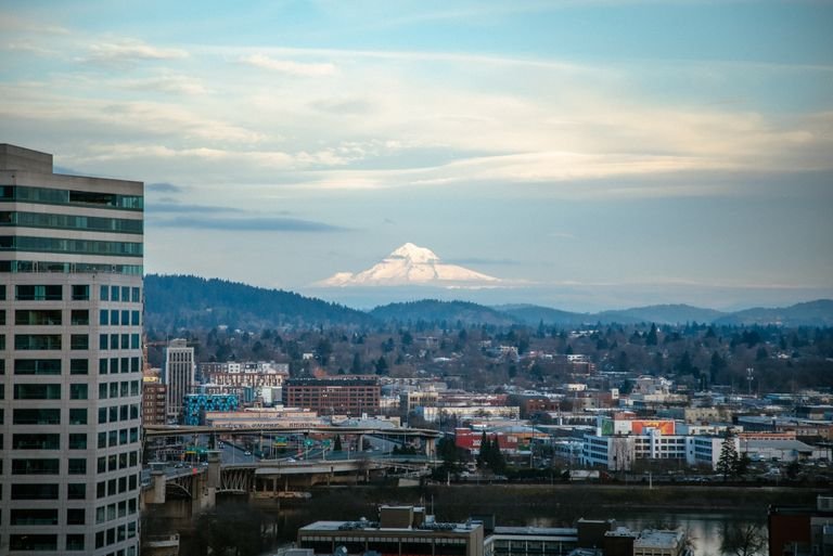 downtown Portland Oregon skyline with Mt Hood vegan travel itinerary