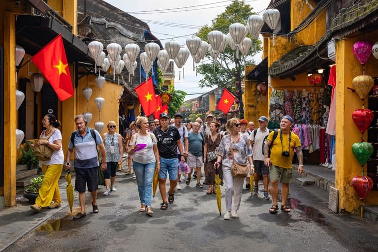 Guided vegan food tour group at a local market