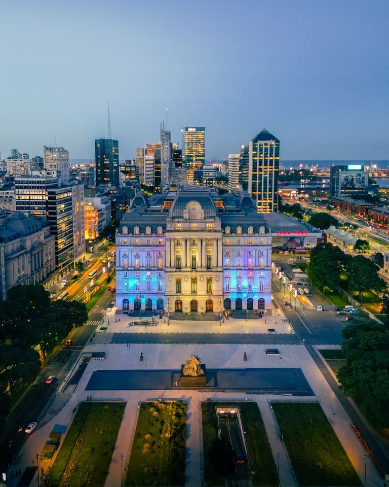 Stunning aerial view of Buenos Aires cityscape with illuminated palace at night. vegan travel in argentina